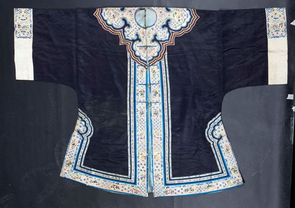 A silk dark blue-ground dress with golden embroidery, China, Qing Dynasty, 19th century