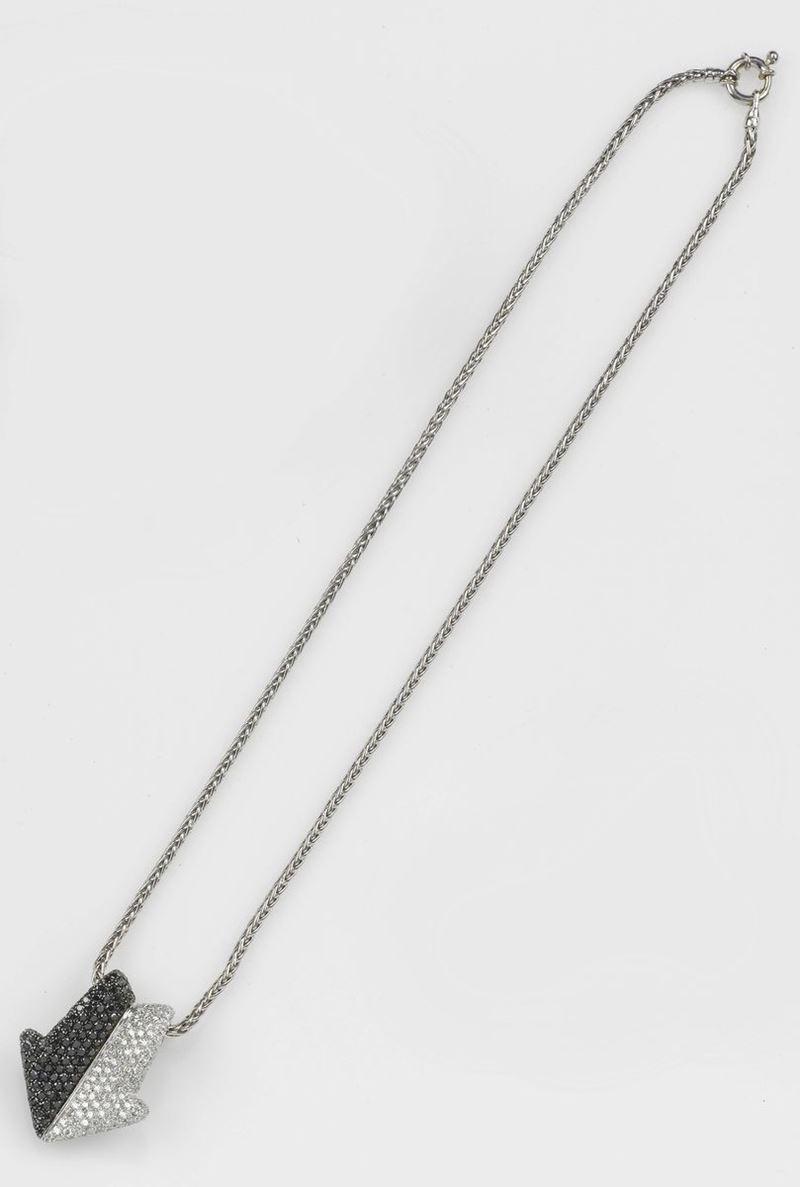 Enigma. A diamond pendant. Set with the white and black pavé-set diamonds  - Auction Fine Jewels - Cambi Casa d'Aste