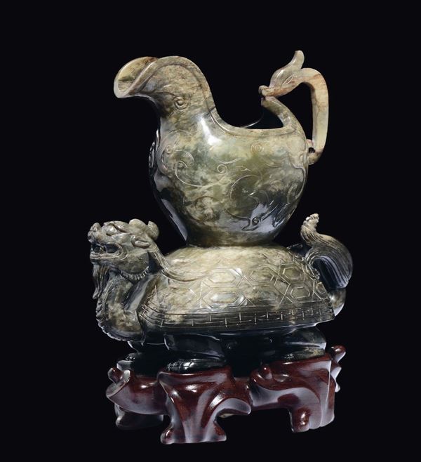 A small green and russet jade tortoise and vase group, China, 20th century