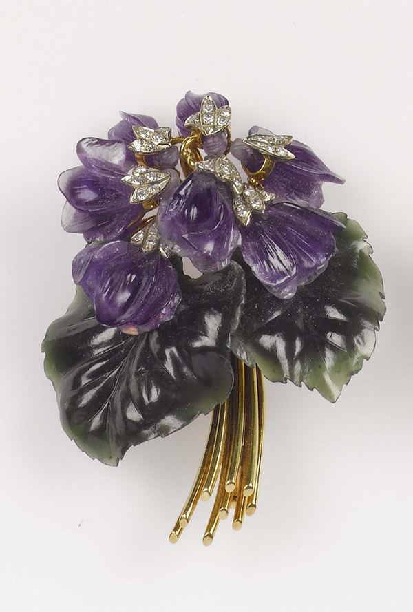 A nephritis, amethyst and diamond brooch. Mounted in yellow gold 750/1000