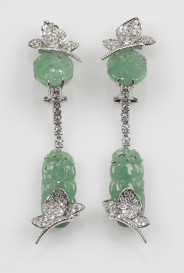 A jadeite and diamond pendant earrings. Mounted in white gold 750/1000