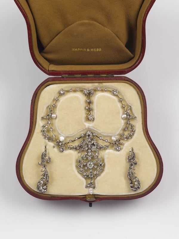 Parure composed of rose-cut diamond necklace and earrings. The pendant could be endorsed also as a brooche. Original box