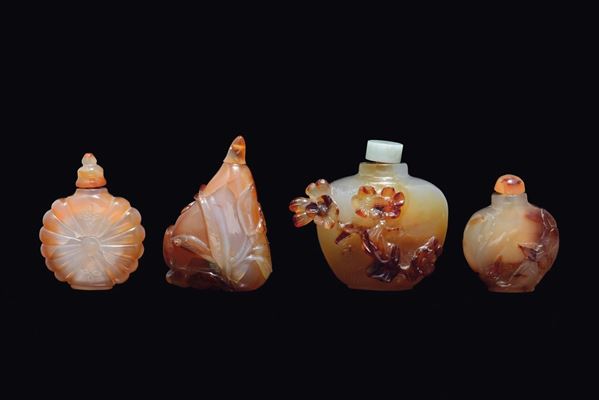 Quattro snuff bottles in agata corneliana di forme diverse, Cina, Dinastia Qing, XIX secolo