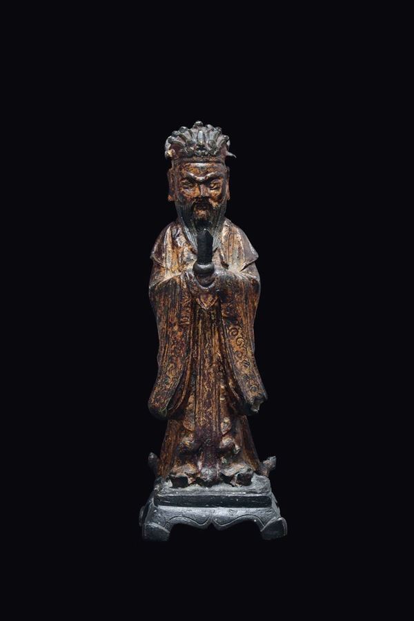 A semi-gilt bronze figure of dignitary, China, Ming Dynasty, 17th century