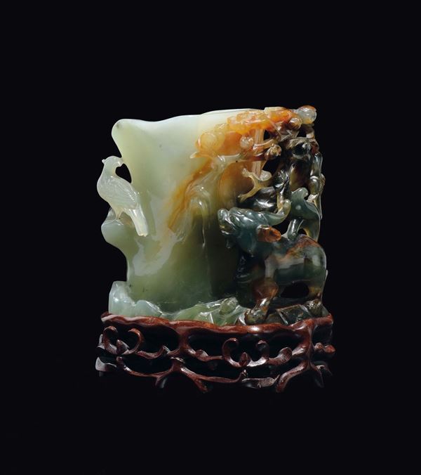 A Celadon and russet jade brushpot with dog and little bird, China, 20th century