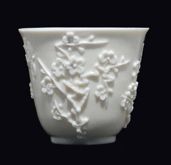 A Blanc de Chine Dehua wine vessel with cherry blossoms in relief, China, Ming Dynasty, late 17th century