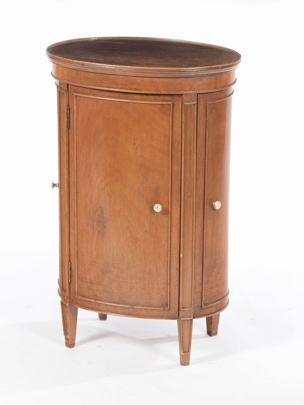 Comodino ovale in noce ad uno sportello, XIX secolo