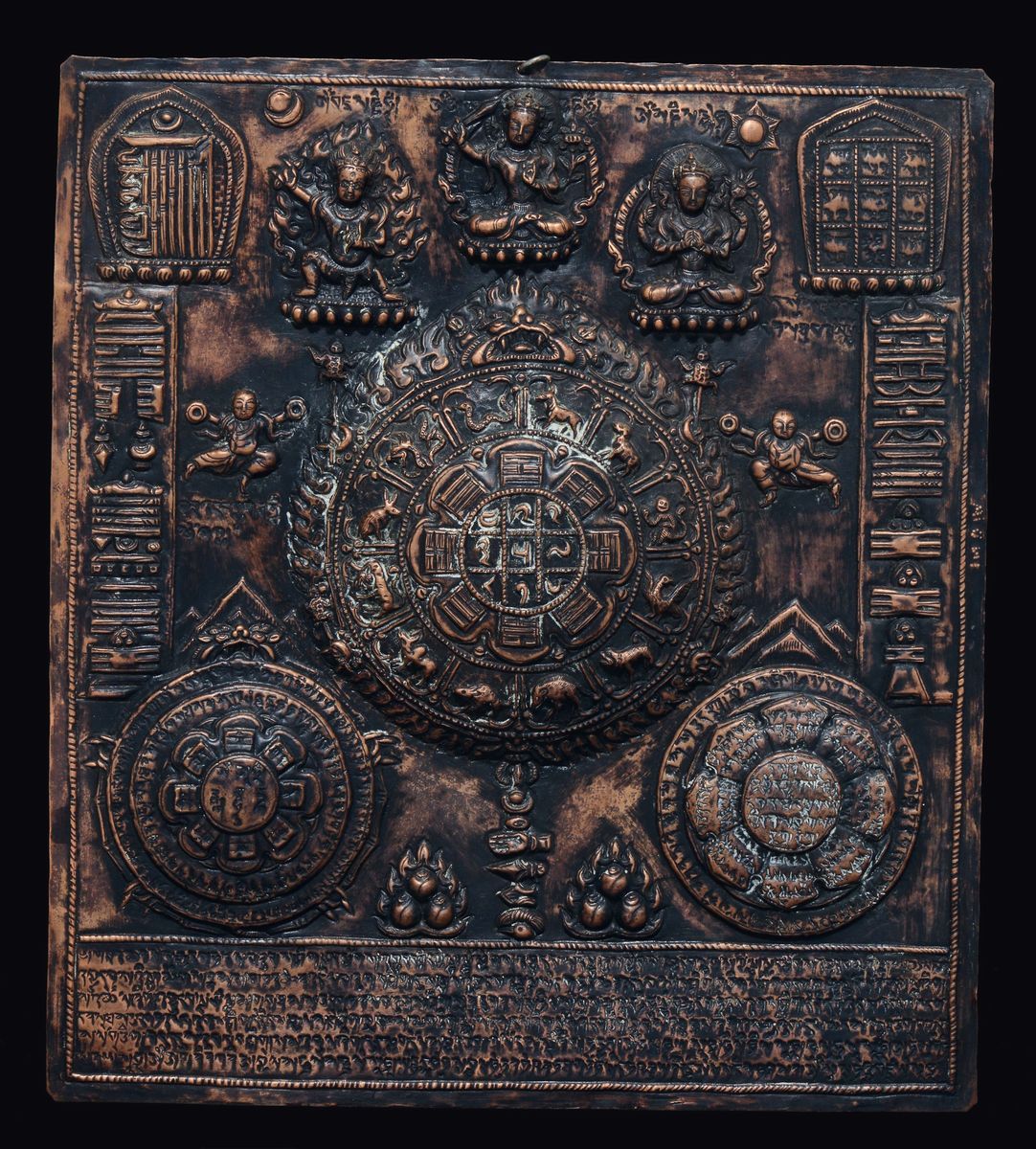 Due Placche in Rame Sbalzato Raffiguranti Divinità e Ruota con Segni Zodiacali, Tibet, XIX Secolo
