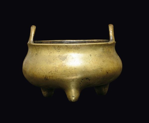 A small bronze tripod two-handled censer, China, Ming Dynasty, 17th century
