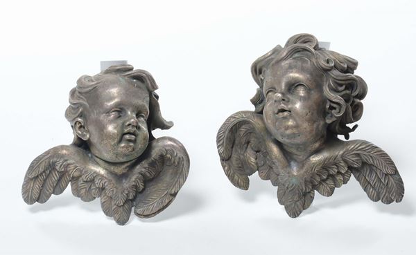 Due cherubini in metallo argentato, XX secolo