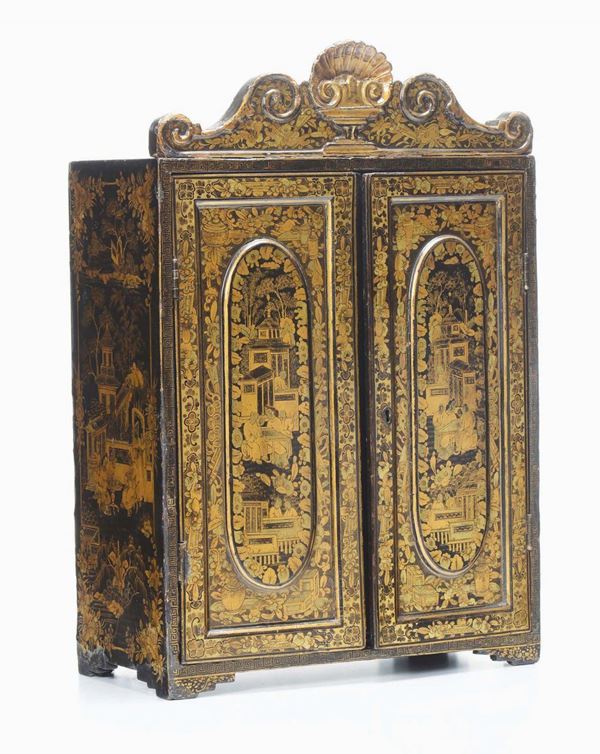 A lacquered wood cabinet with gilt floral and naturalistic decoration, China, Qing Dynasty, early 19th century
