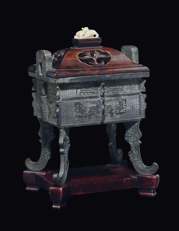 A large archaistic bronze censer and wooden cover with a white jade grip, China, Qing Dynasty, Qianlong Period (1736-1795)