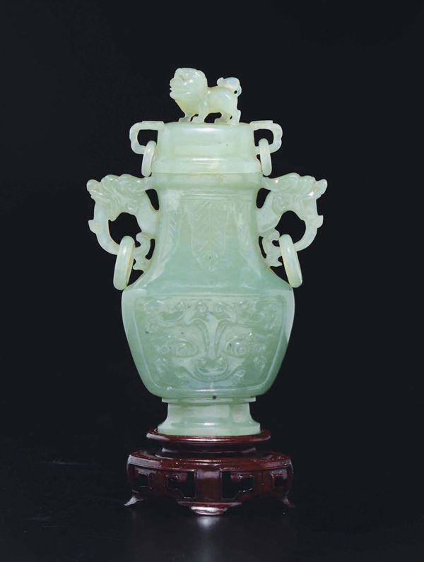 A green jade double ring-handles vase and cover with Pho dog, China, 20th century