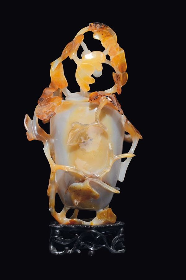 An agate vase and cover with branches in relief, China, Qing Dynasty, 19th century