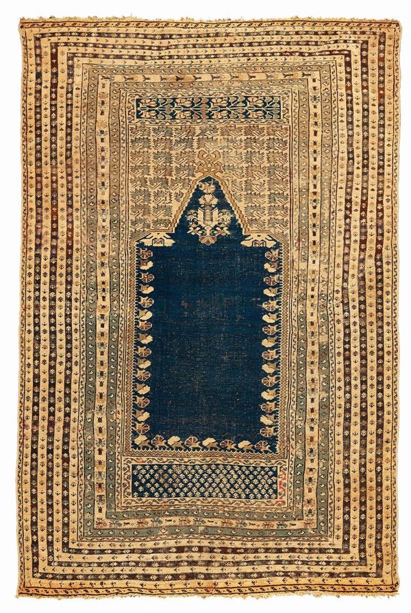 A Ghiordes prayer rug late 19yh  early 20th century cm 155x100.