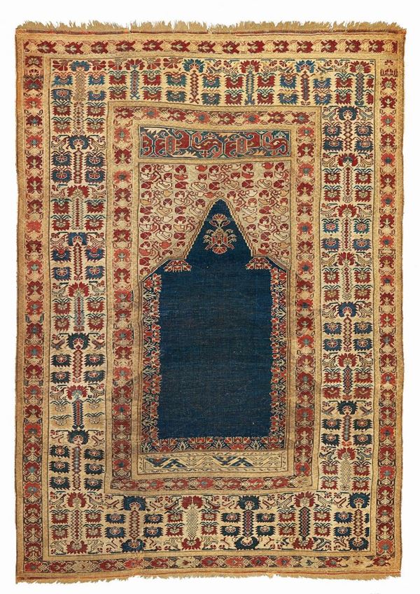 A Ghiordes prayer rug West Anatolia 19th century cm 176x130. Sides not originally good condition.