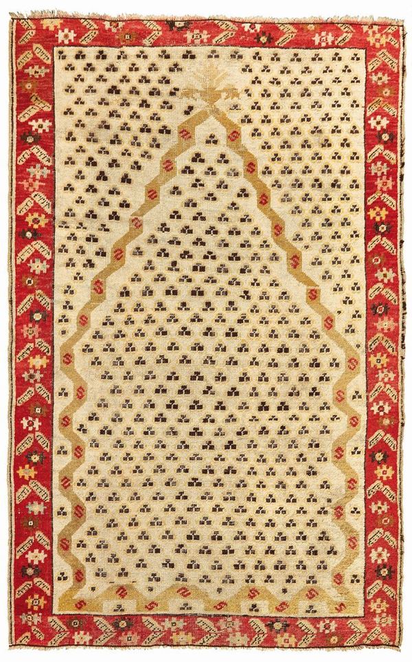 A Kirschir prayer rug West Anatolia late 19th early 20th century cm 156x100. Sides not originally.