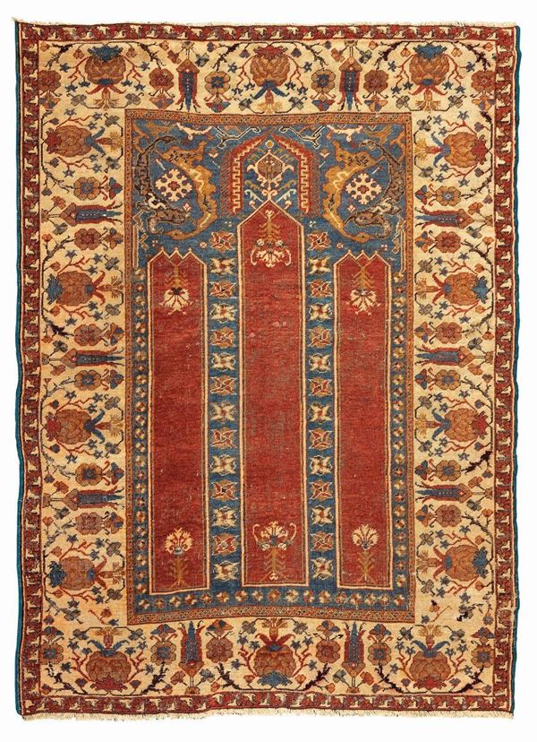 An Anatolia prayer rug, late 19th century. cm 170x130. Sides not originally.