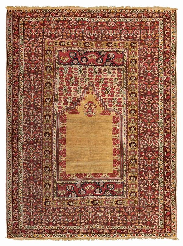 A Ghiordes rug West Anatolia early 19th  century cm 183x138. Sides mpt originalòly.