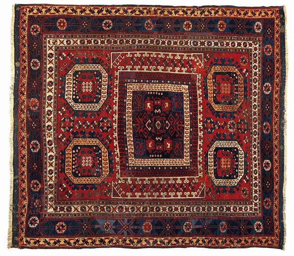 A Bergama rug first half 19th century cm 190x170.Some repairs and some stains