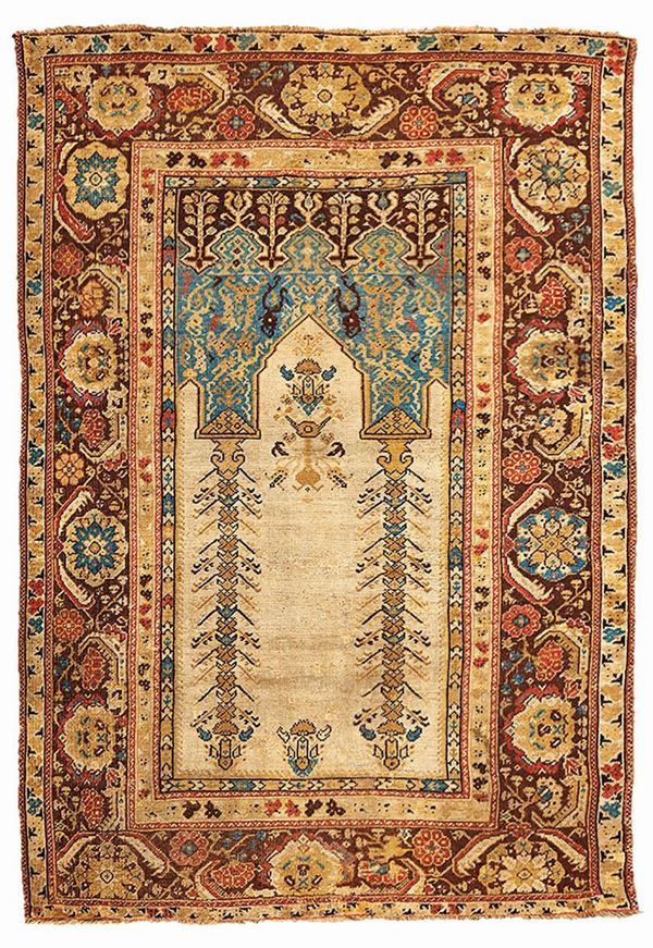 A Koula rug early 19th century cm 180x123. Sides not originally.