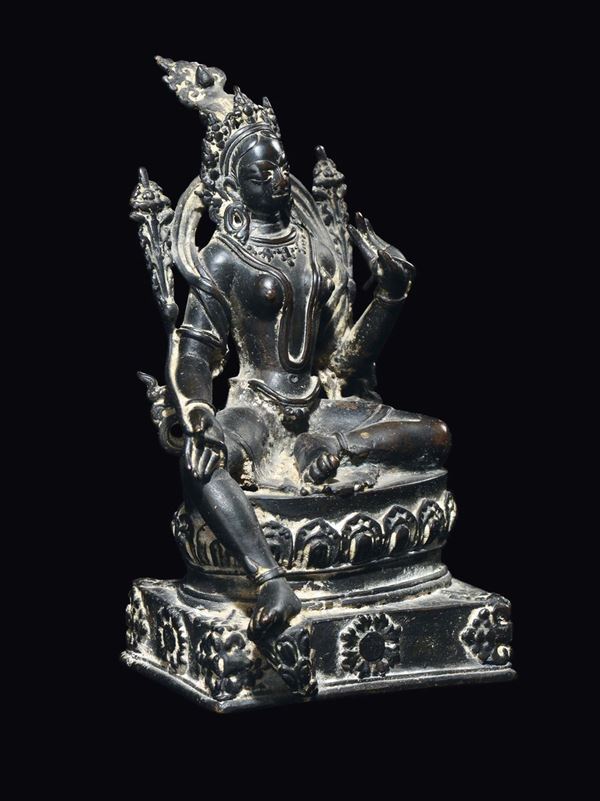 A bronze figure of seated Tara, Nepal, 14th century