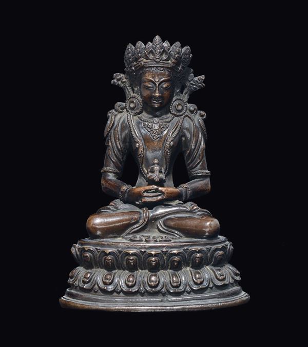 A bronze figure of seated Amitaya with cup, Nepal, 17th century