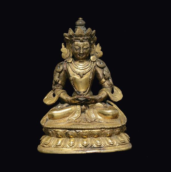 A gilt bronze figure of Amitayus, Tibet, 18th century
