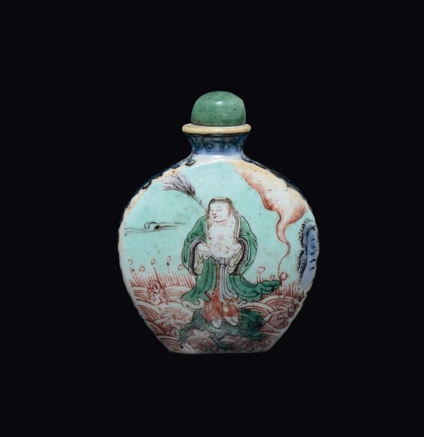 A polychrome enamelled porcelain wise man and children snuff bottle, China, Qing Dynasty, 19th century