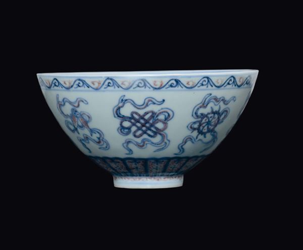 An underglazed-blue and iron red porcelain bowl, China, Qing Dynasty, Kangxi Mark and of the Period (1662-1722)