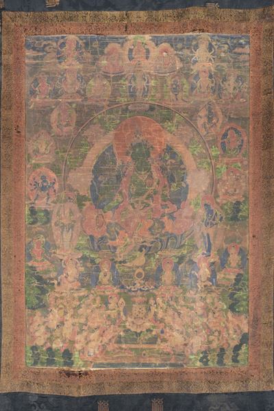 Tanka su Seta a Fondo Blu e Verde con Divinità Centrale su Fiore di Loto, Tibet, XVIII Secolo