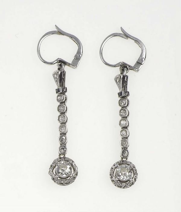 A pair of old-cut diamond earrings