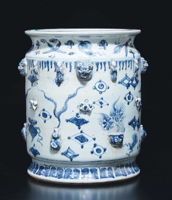 A blue and white cachepot with naturalistic decorations in relief, China, 20th century