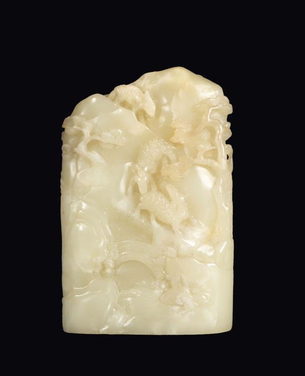 A white jade mountain with bats and goats in relief, China, Qing Dynasty, 19th century