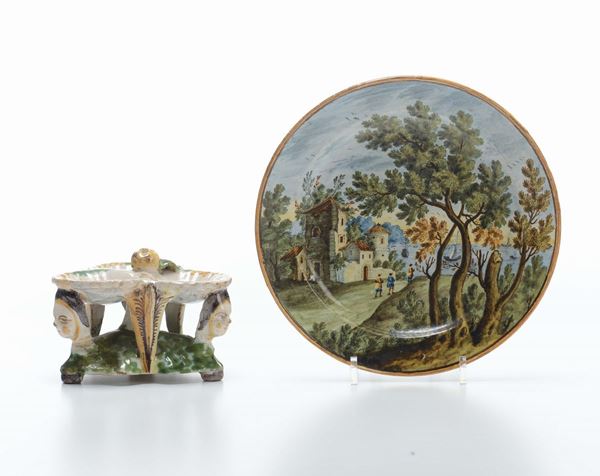 Piatto Castelli con paesaggio, e salierina in maiolica policroma, fine XVIII secolo
