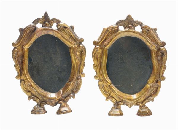 Coppia di specchierine intagliate ed interamente dorate a mecca, XIX secolo