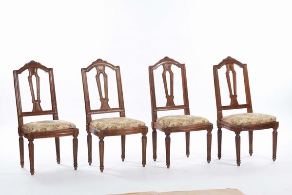 Quattro sedie in stile Luigi XVI in noce, XIX secolo