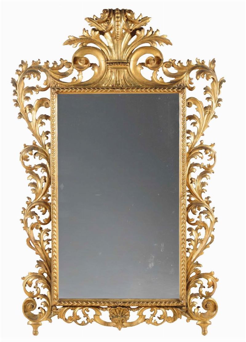 Specchiera in legno intagliato e interamente dorato, Toscana XIX secolo  - Asta Cornici Antiche - Cambi Casa d'Aste