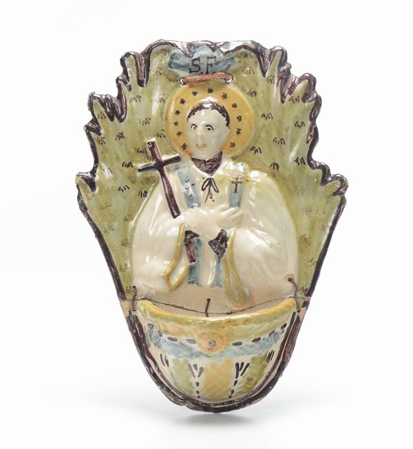 Lotto di quattro acquasantiere in maiolica policroma, XVIII-XIX secolo