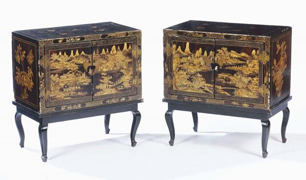 A pair of lacquered wood cabinet depicting river landscapes, China, Qing Dynasty, 19th century