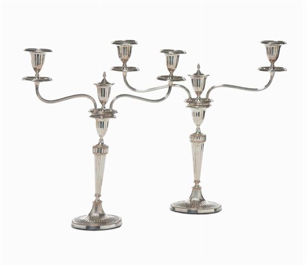 Coppia di doppieri in argento, XX secolo