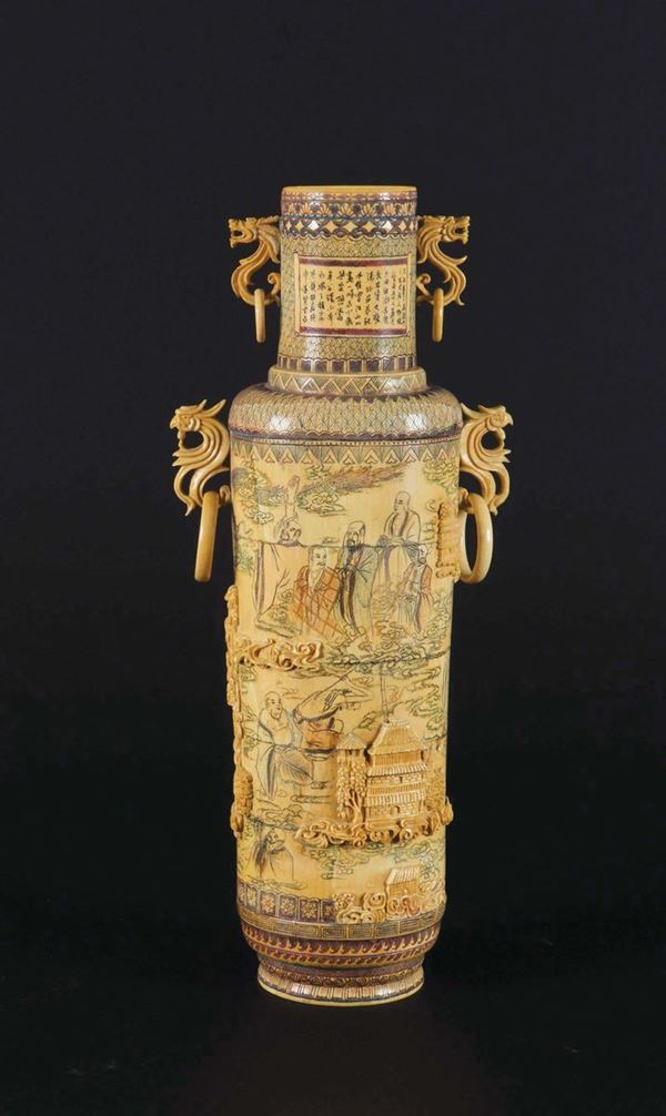 A carved and painted ivory vase with eighteen Luohan, China, early 20th century