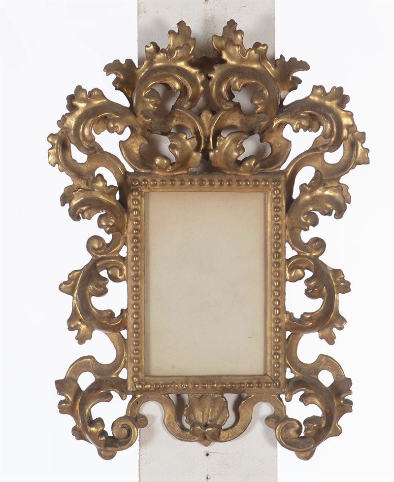 Cornicetta riccamente intagliata a volute e dorata , XIX secolo  - Auction Fine Old Frames - Cambi Casa d'Aste