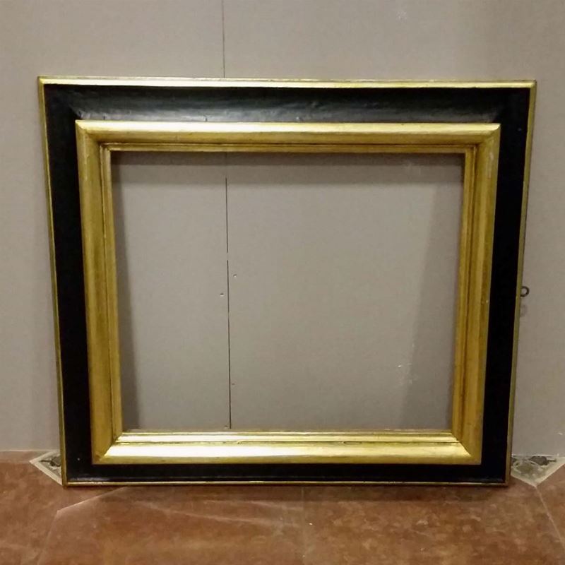 Grande cornice in legno ebanizzato con profili dorati, XIX-XX secolo  - Auction Antique Frames - I - Cambi Casa d'Aste