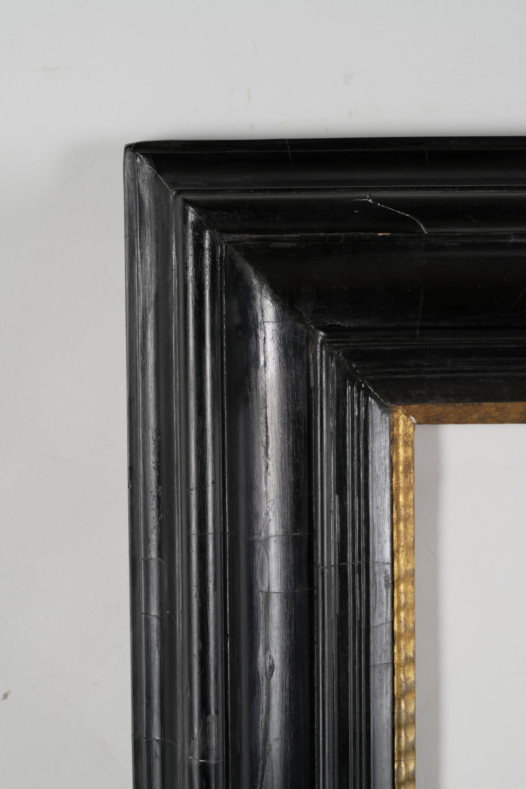 Cornice in legno ebanizzato e dorato, cornice per specchio o quadro,  XIX secolo