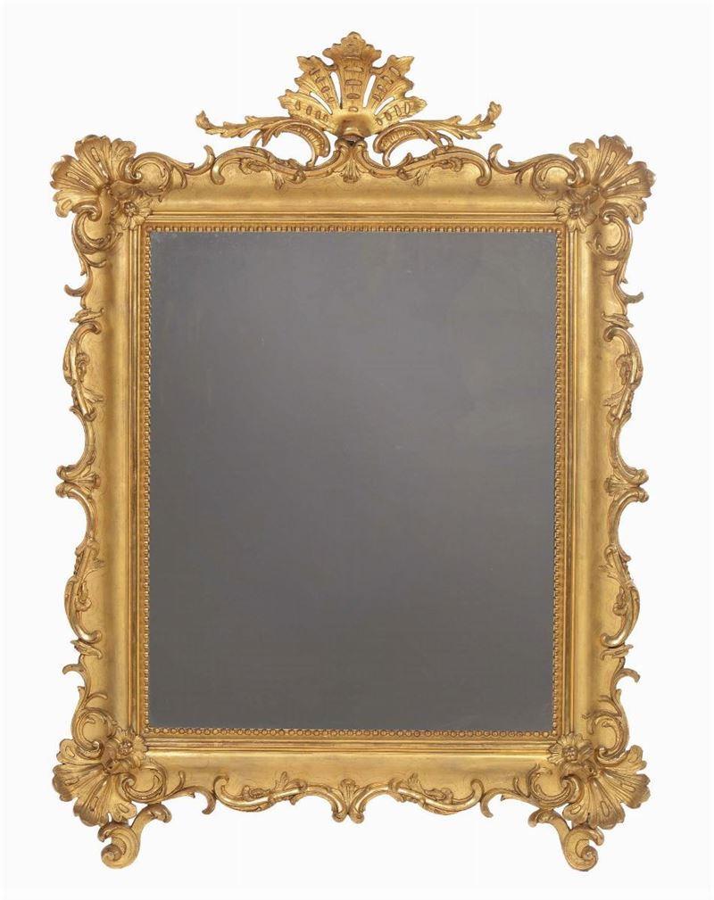 Grande specchiera riccamente intagliata e dorata, XIX secolo  - Asta Cornici Antiche - Cambi Casa d'Aste