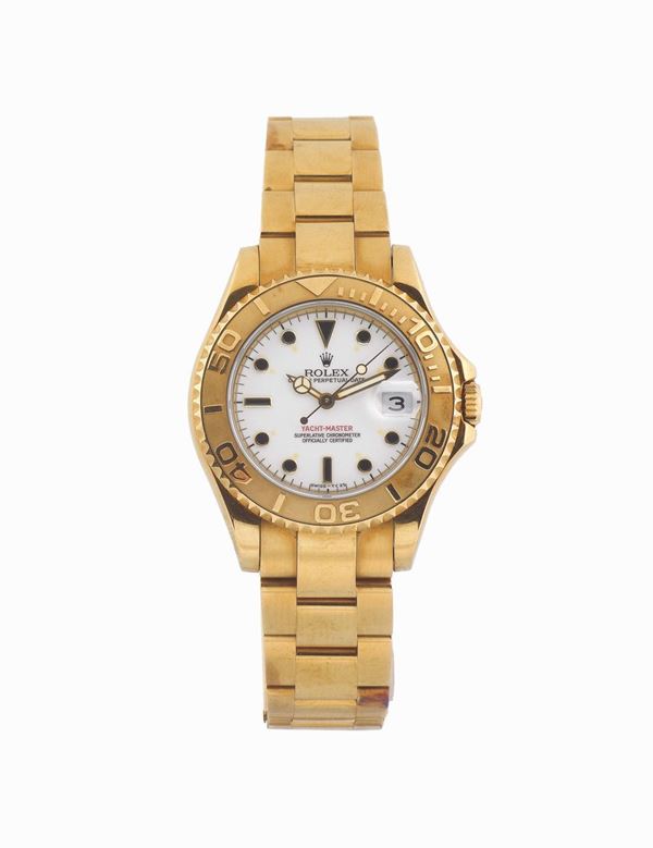 ROLEX,  Oyster Perpetual Date, Yacht-Master, Superlative Chronometer, Officially Certified, Ref. 68628, yellow gold, water resistant, self-winding wristwatch with date and  an 18K yellow gold Rolex Oysterlock bracelet. Made in the 1990's