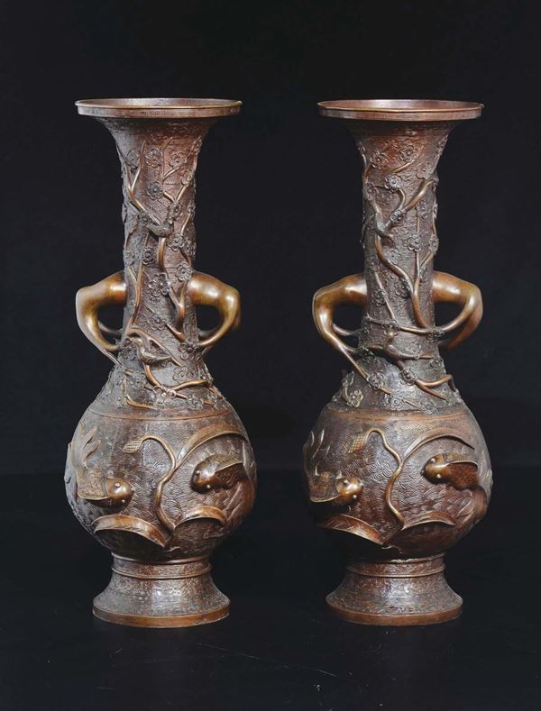 A pair of bronze double-handles vases with fish in relief, Japan, 19th century