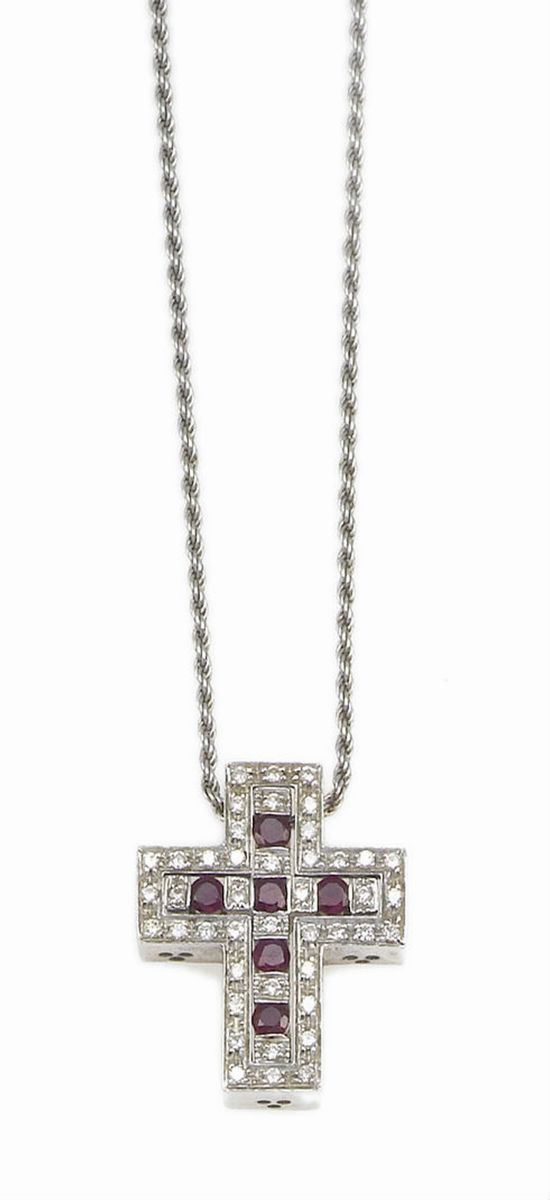 Damiani. A ruby and diamond cross pendant
