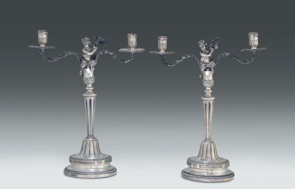 Bella coppia di doppieri in argento fuso, sbalzato e cesellato, Genova ultimo quarto del XVIII secolo,  [..]